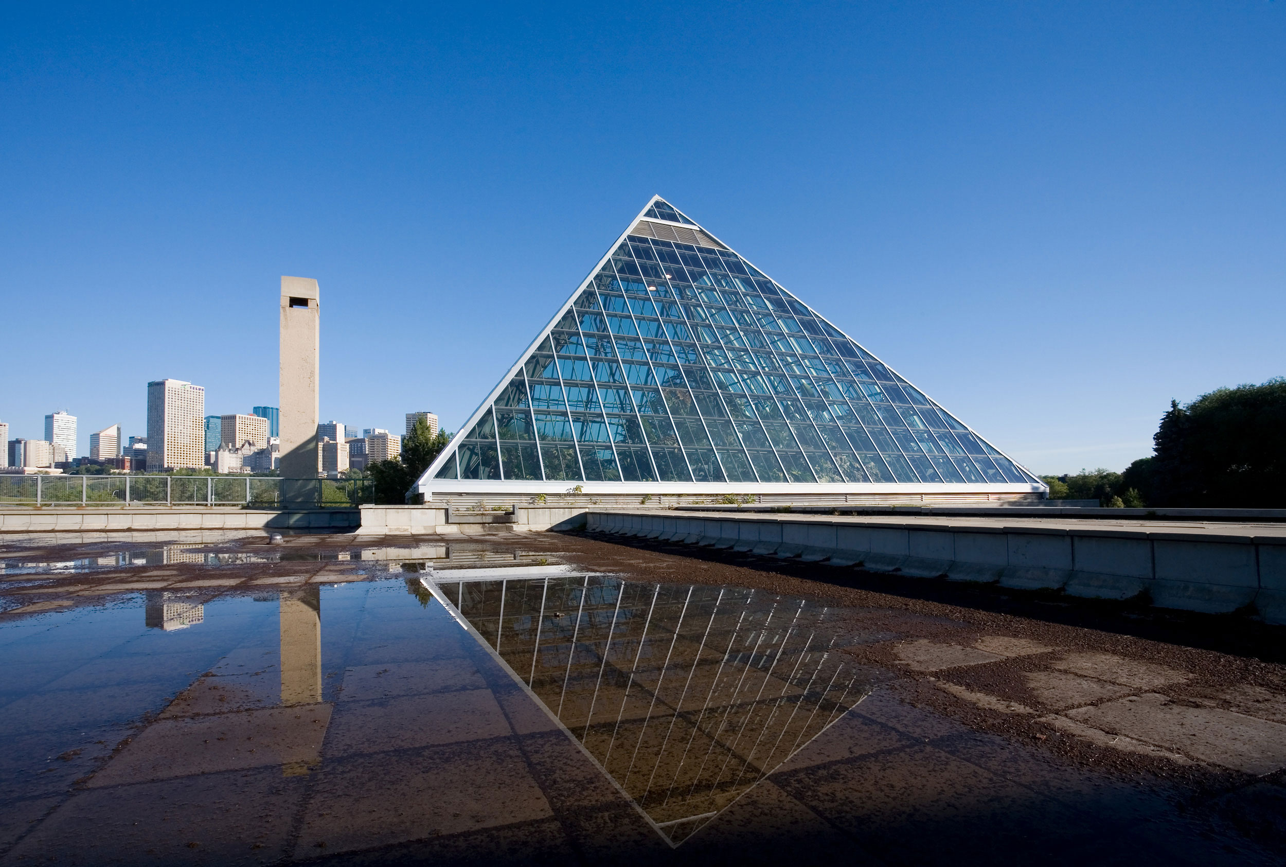 Reflection of Muttart Conservatory with Edmonton in back