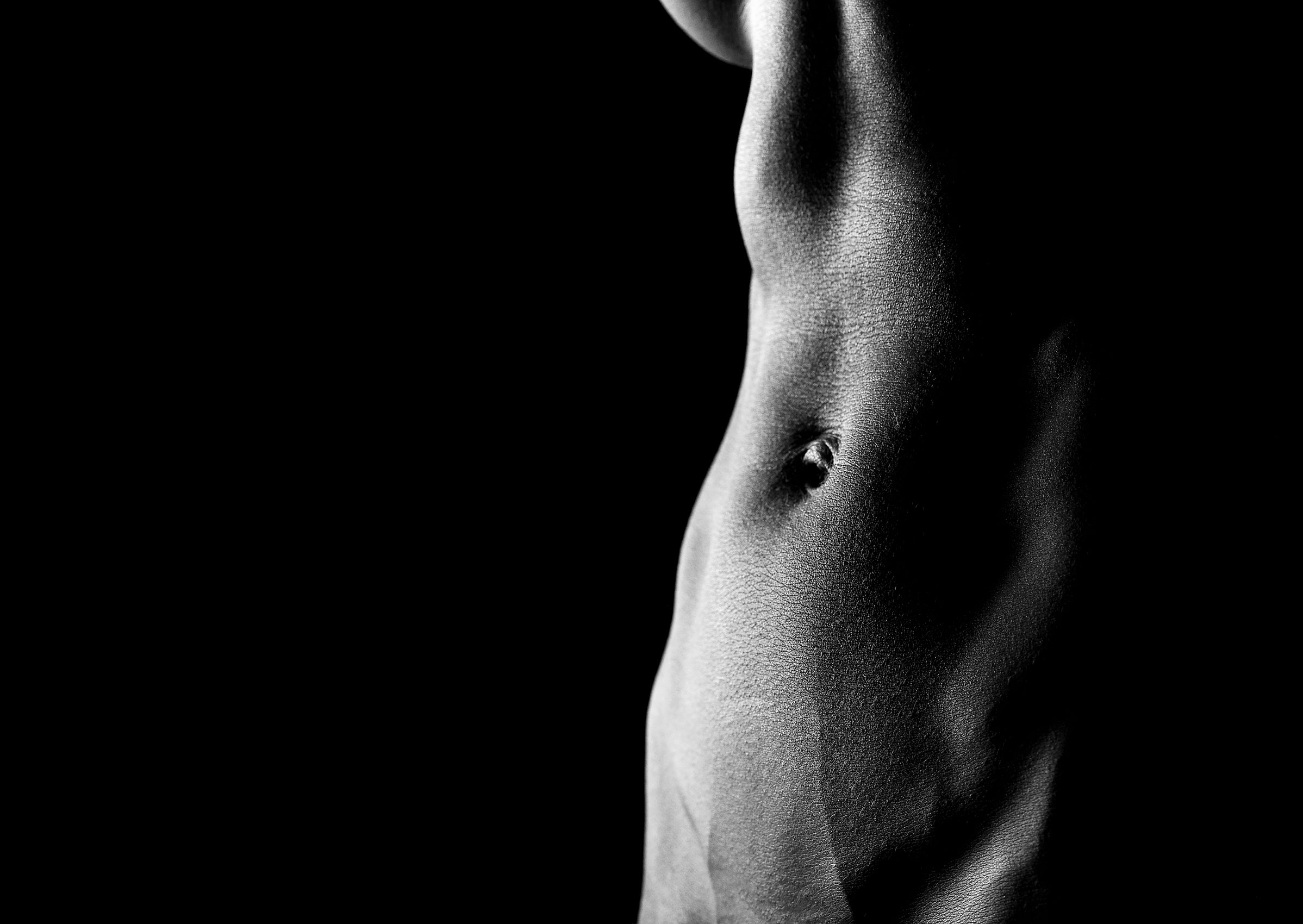 High contrast photo of sexy naked female athlete